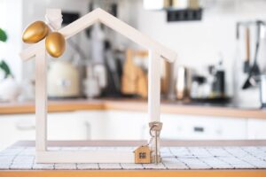 key-and-tiny-house-of-cozy-home-with-easter-decor