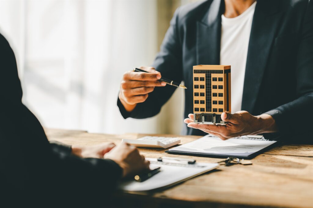 real-estate-agent-delivering-sample-homes-to-customer